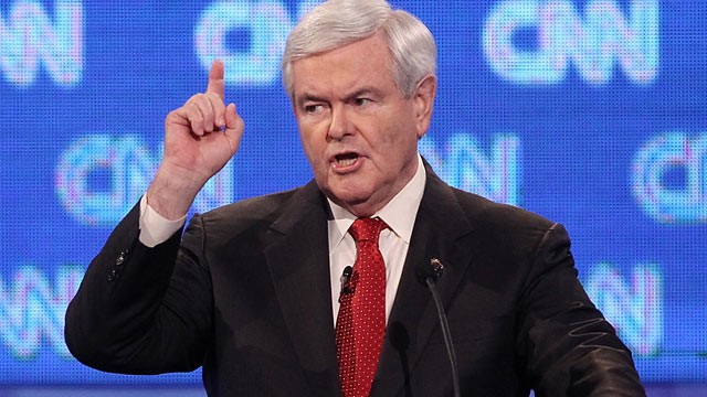 Newt Gingrich points up to the moon